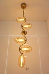 swanart Modern Gold Spiral Chandelier - 5-Light Pendant Fixture with Elegant Amber Glass Shades | Decorative Ceiling Light for Living Room, Dining Room – Creates Stunning Warm Ambiance & Statement